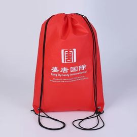 中国 オフセット印刷の綿のキャンバス材料が付いている赤いスポーツのドローストリングのバックパック サプライヤー