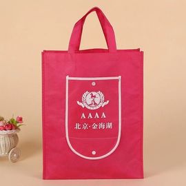 中国 彼ら自身に折る薄赤の再使用可能な買い物袋はロゴをカスタマイズしました サプライヤー