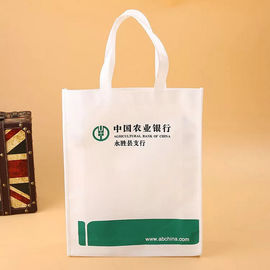 中国 表面の印刷されたロゴの白いおよび緑の非編まれた生地袋 サプライヤー