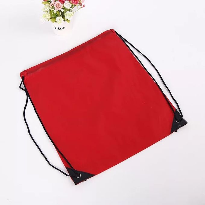 オフセット印刷の綿のキャンバス材料が付いている赤いスポーツのドローストリングのバックパック
